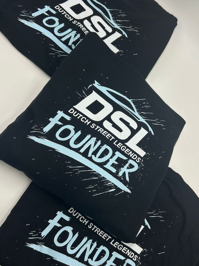 Zwarte kleding met DSL Founder-bedrukking voor Dutch Street Legends
